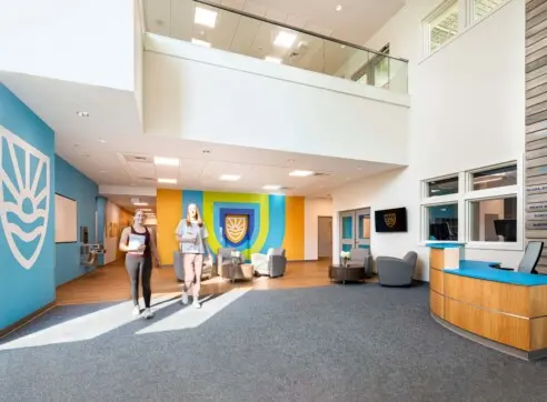 Riverview School Wellness Center Hero Cohen Center Recreation Wellness School Educational Architecture Lobby Donor Wall v3 2022 12 16 124717 aoso