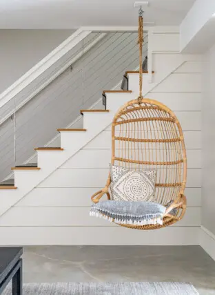 Coastal Retreat Tall Architecture Interiors Master Planning Landscape Interior Design Hanging Chair Shiplap Stairs Runner Family Space 2022 12 16 124356 hwzq