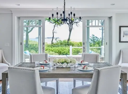 Seaside Elegance Hero Dining Room Space Indoor Outdoor Connection Furnishings Natural Light Architecture Interior Design Decor Orleans Cape Cod 2022 12 16 124435 phyx