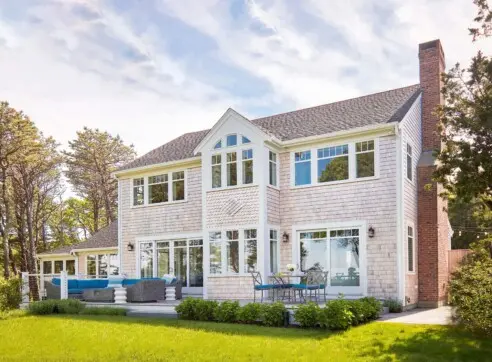 Seaside Elegance Hero Exterior Shingle Style Rear Patio Fireplace Natural Light Architecture Interior Design Decor Orleans Cape Cod 2022 12 16 124438 vdtf