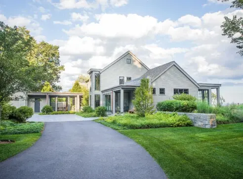 Inside Out Hero Exterior Front Facade Front Entry Bronze Neutral Color House Garage Connector reduced 2022 12 16 124649 bqzm